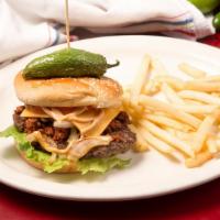 Mexicana · Beef patty, chorizo, grilled onions, jalapeños, cheddar cheese, lettuce, tomato, avocado, an...