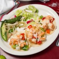 Quesadilla De Alambre De Camarón · It comes with salad on the side. Grilled shrimp, bell peppers, onion, bacon, mozzarella chee...