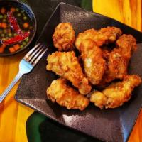 Dry Roast Chicken · Hot and spicy. Spicy deep fried wings with hot sauce.