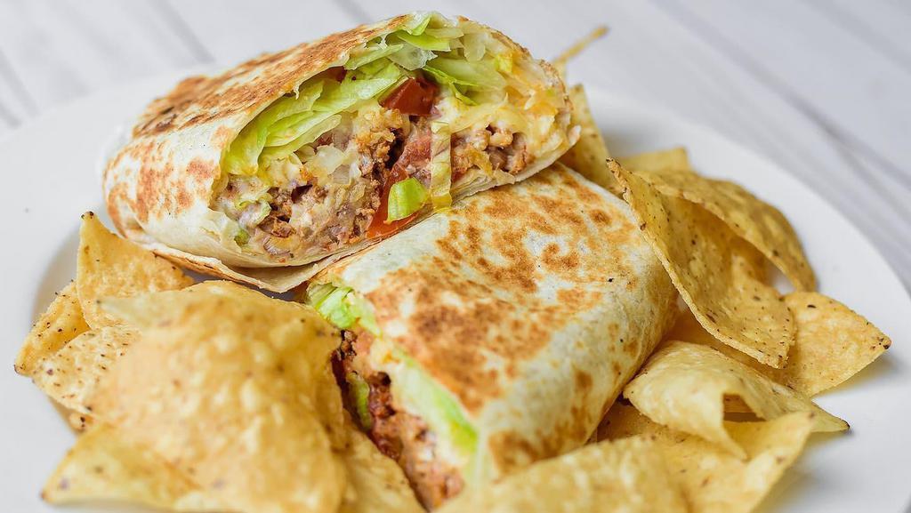 Burritos · Crispy flour tortilla rolled to perfection. Includes lettuce, tomato, sour cream, cheese, avocado, cilantro, onion and beans. Please add a note if you'd like any of the toppings removed.