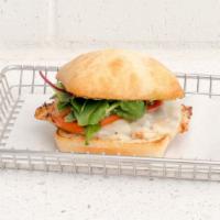Cockadoodledoo · Grilled Chicken on Ciabatta with Spring Mix, Tomatoes, Swiss Cheese, Smoked Bacon, Carameliz...