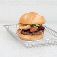 Dragonslayer · 1/3 lb. Top Sirloin Patty Mixed with Bleu Cheese Crumbles, Topped with Smoked Bacon, Tomatoe...