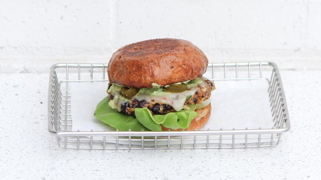 Black Bean · Vegetarian. Black Bean Quinoa Patty Topped with Pepper Jack Cheese, Butter Lettuce, Tomatoes, Pickled Jalapeños, Lime Juice and Avocado Spread on a Sprouted Wheat Bun.


Contains dairy. Contains eggs. Contains nuts. Contains gluten. Contains soy. Soy in bread. Nuts in sauce.