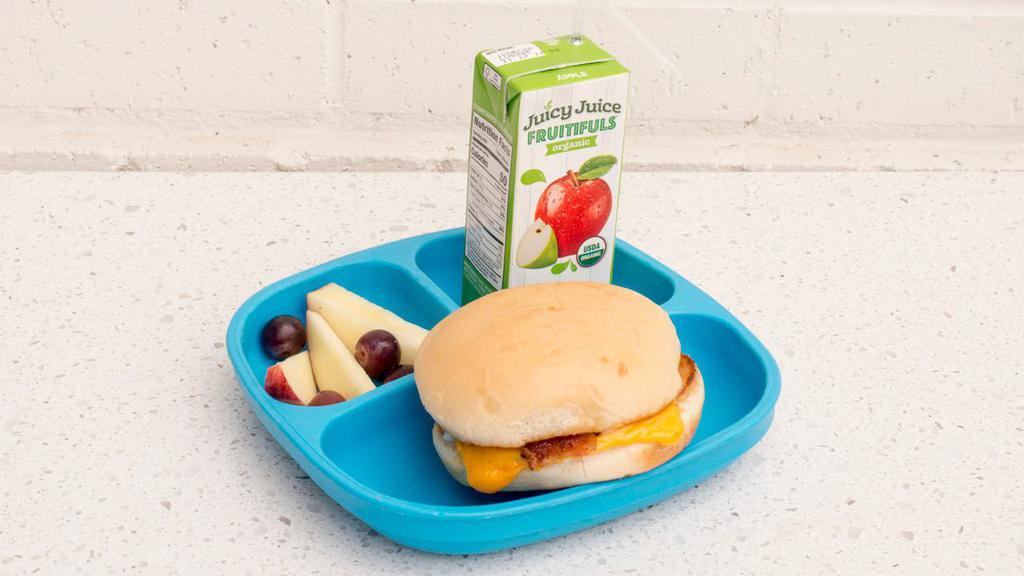 Kids Grilled Cheese Sandwich · American Cheese, Mayo, and Bacon.

Contains dairy. Contains eggs. Contains gluten. Contains soy. Soy in bun, egg in topping.