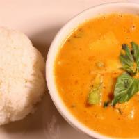 Red Curry · Spicy red curry with coconut milk, bamboo shoot, bell pepper, and sweet basil.