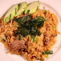 Thai Basil Fried · Stir fried jasmine rice with garlic, mushroom, sweet basil, chili paste, onion, egg, mushroo...