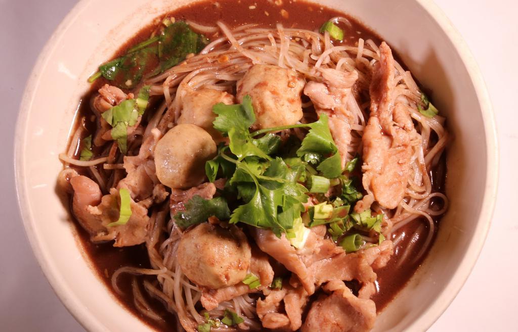 Boat Noodle Soup · Broth with pork, pork meatball, green onion, cilantro, spinach, and bean sprout. Served with your choice of noodles.