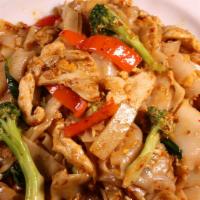 Phad Kee Mao · Drunken noodles. Wide rice noodle with egg, chili paste, onion, bell pepper, bamboo shoot, b...