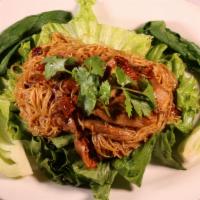 Mee Yok Ped Duck Noodles · Steamed bok choy, bean sprout, egg noodles, green leaf, and roasted duck. Served with hoisin...