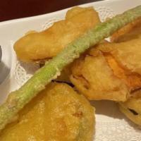 Vegetable Tempura (7 Pcs.) · Assorted vegetables dipped in a light and flaky Japanese batter and deep-fried.