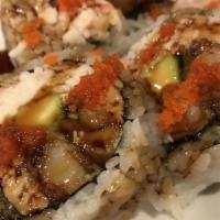 Shrimp Tempura Roll (5 Large Pcs.) · 2 large tempura shrimp, crabmeat and avocado topped with masago