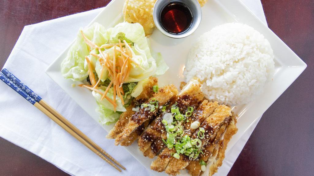 Chicken Katsu · Chicken dredged in Japanese Panko and deep-fried. Drizzled with a semi-sweet and tangy fruity vegetable sauce.