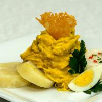 Aji De Gallina · Peruvian classic shredded chicken, with creamy aji amarillo sauce. DON'T order if you have N...