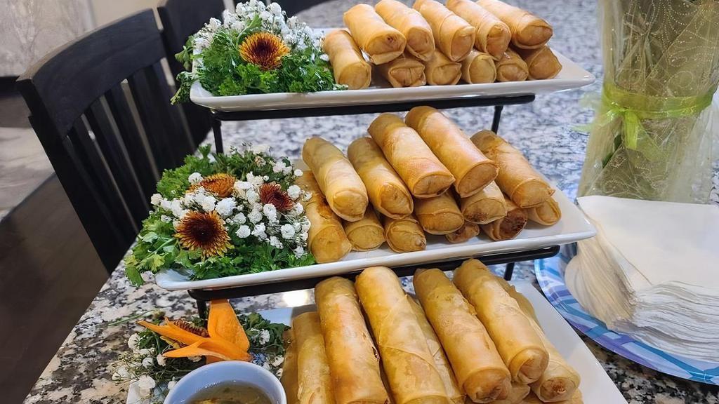 Crispy Spring Rolls · Mashed seasoned sweet potato spread on spring roll paper with carrots, cabbage, and tofu (2pcs)