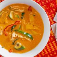Red Curry · Red curry with coconut milk, bamboo shoots, bell pepper, Thai Eggplant, green beans, basil l...