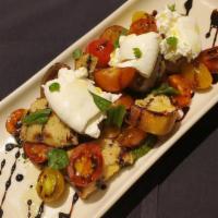 Heirloom Tomatoes & Burrata · Nordstrom signature recipe. grilled sourdough croutons, extra virgin olive oil, balsamic vin...