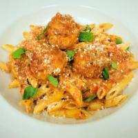 Penne Bolognese & Meatballs · chicken meatballs, spicy Italian sausage, red bell pepper, tomato cream sauce, parmesan chee...