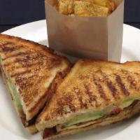 Santa Fe Chicken Panini · blackened chicken, jack cheese, roasted red peppers, caramelized onion, avocado, chili peppe...