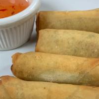 Veggie Rolls · Fine slices of cabbage, carrot, celery, glass noodle wrapped and lightly fried.