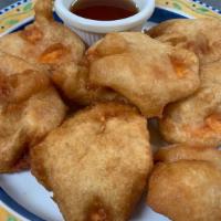 Thai Sweet Potatoes · Eight pieces. Lightly fried sweet potatoes. Served with plum sauce.