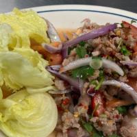 Pork Salad · Gluten free. Nam sod. Minced pork seasoning with mint leaves, ground roasted rice, ginger an...