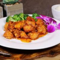 Orange Chicken · Breaded chicken tried and mixed with orange sauce. Served with steamed broccoli. Served with...