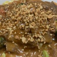 Rama · Your choice of meat sauteed with Thai peanut sauce on a bed of steamed vegetables. Served wi...