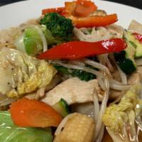 Veggie Lover · Yellow onion, mushroom, carrot, broccoli, cabbage and bean sprout. Served with steamed Thai ...