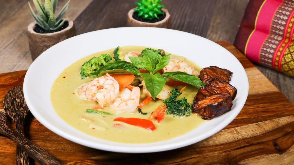 Green Curry · Gluten free. Green curry sauce with bamboo shoot, carrot, bell pepper, long beans, broccoli, eggplant and basil. Served with Thai jasmine rice.
