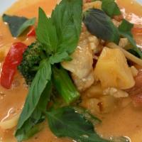 Pineapple Curry · Gluten free. Pineapple, bamboo shoot, bell pepper, carrot and tomato with blended Thai spice...