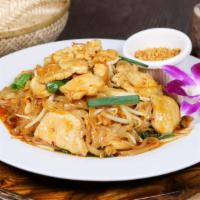 Pad Thai · Gluten free. Thai rice noodle sauteed with egg, tofu, green onion, bean sprout and crushed p...