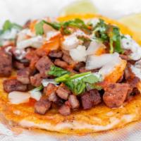 Quesataco · Quesadilla Taco w/ your choice of meat on top