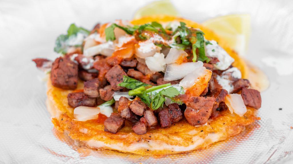 Quesataco · Quesadilla Taco w/ your choice of meat on top