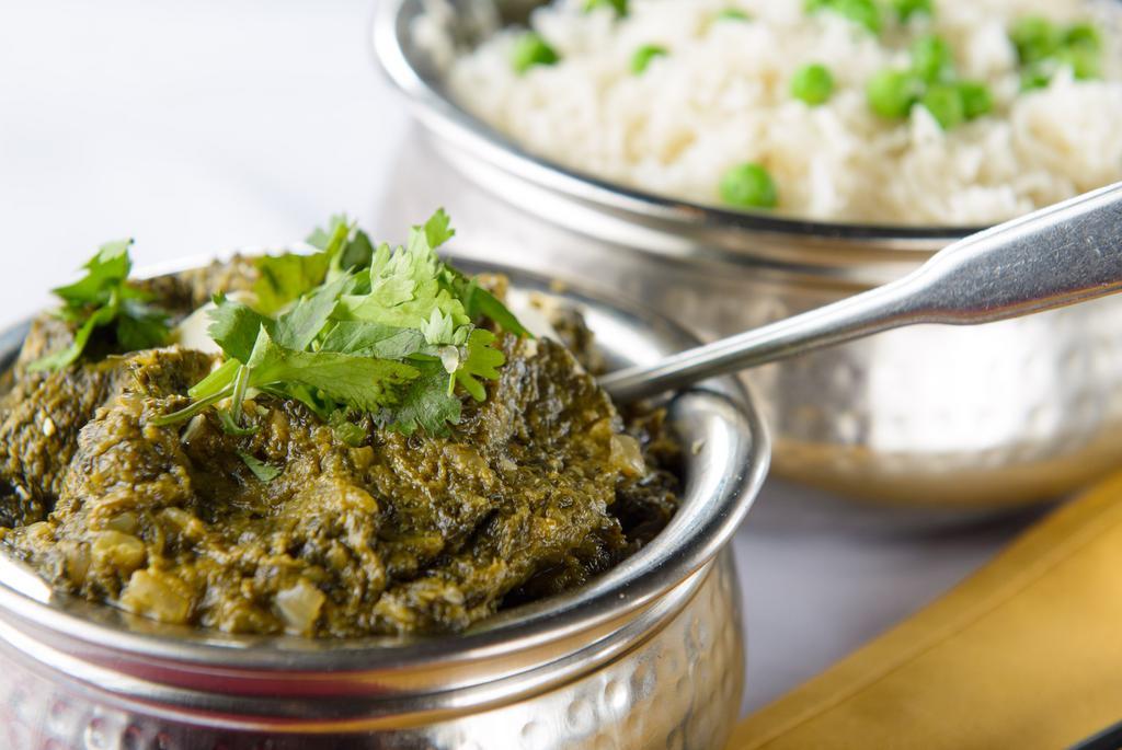 Palak Paneer · Home-made Indian cheese cubes & spinach with spices and herbs.