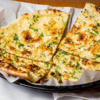 Garlic Naan · Unleavened bread with fresh coriander and garlic.