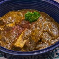 Lamb Saag · Tender pieces of lamb cooked with spinach and spices.