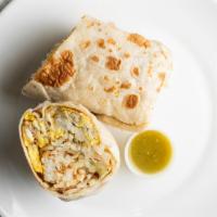 Breakfast Burrito · Hash browns, eggs, cheese, and meat of your choice (choices can be bacon or ham).