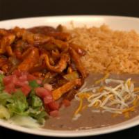 Pollo Ranchero · Chicken breast cooked with onions, tomatoes, green bell peppers in our special mild red sauc...