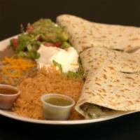 Quesadilla Plate · A flour tortilla with fresh melted cheese, choice of meat. Served with rice, beans, sour cre...