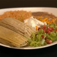 Tamale Plate · Two tamales pork tamales. Served with beans and rice.