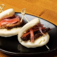 Belly Bao Buns · Chashu pork, kewpie mayo, and pickled tomato salad.