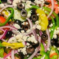 Garden Salad · Fresh lettuce, tomatoes, cucumbers, green peppers, kalamata olives, onions & feta cheese wit...