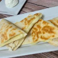 Kids Cheese Quesadilla · Side of sour cream.