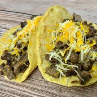 Kids Taco With Cheese · Choice of meat (asada, caritas, pastor, chicken tender, or ground beef) with Cheddar Jack.