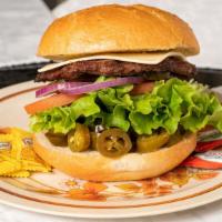 Texas Burger · Onion, pickles, lettuce, tomato, Swiss cheese, jalapeno peppers, mayo & house sauce. Served ...