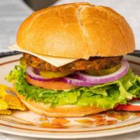 Garden Burger · Onion, pickles, lettuce, tomato, mayo, garden patty, swiss cheese & house sauce.