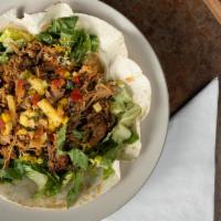 Cha Cha Bowl · This salad is so good, it makes you want to dance! Sweet pork, pineapple-mango salsa, on rom...