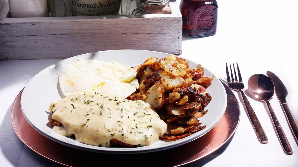 Chicken Fry Steak & Eggs · Hand cut USDA prime steak breaded, fried and smothered in our signature homemade country gravy. Served with two farm fresh eggs. Served with your choice of locally sourced Idaho home fries, fresh-cut fruit medley or heirloom cherry tomato salad & choice of breakfast side.