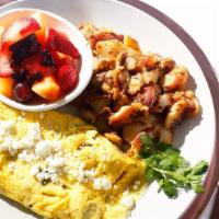 Wild Harvest · A light and airy blend of 3 farm fresh eggs mixed with a blend of wild mushrooms, roasted ga...