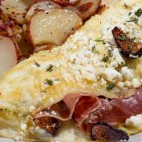 Fig & Cheese · A light and airy farm fresh egg white omelette with garlic chutney spread, prosciutto, slice...